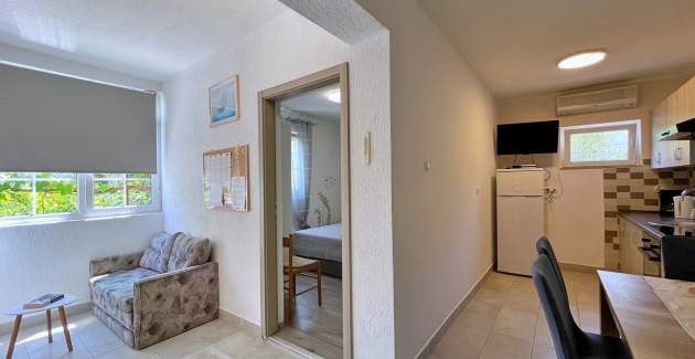 Apartment Mara A4 – Terrasse und Gartenblick