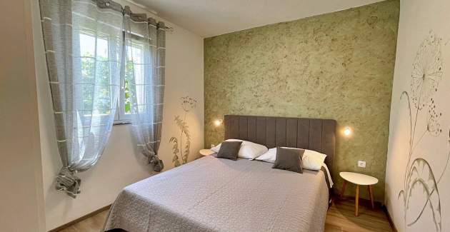Apartment Mara A4 – Terrasse und Gartenblick